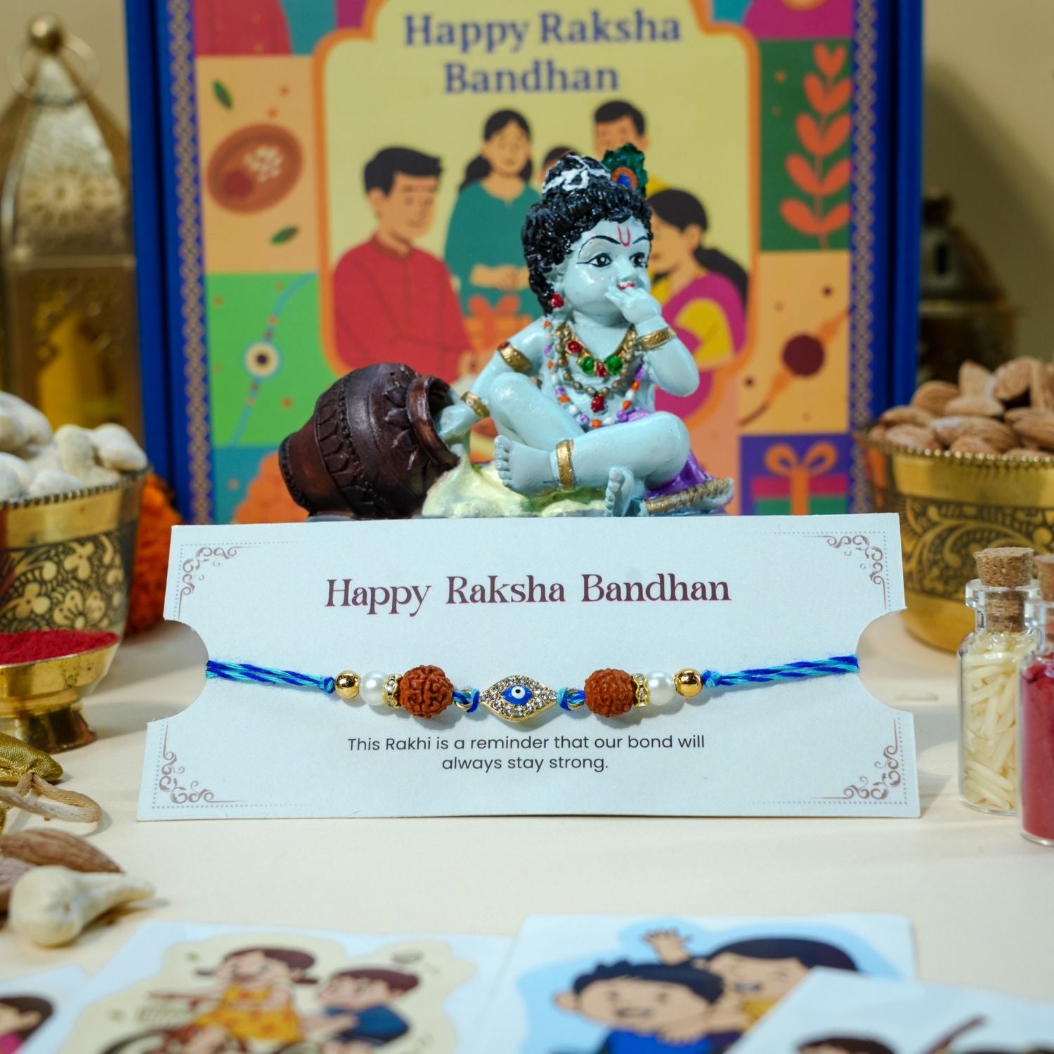 Rudraksha and Evil Eye Rakhi with Krishna idol for Raksha Bandhan spiritual gift hamper.