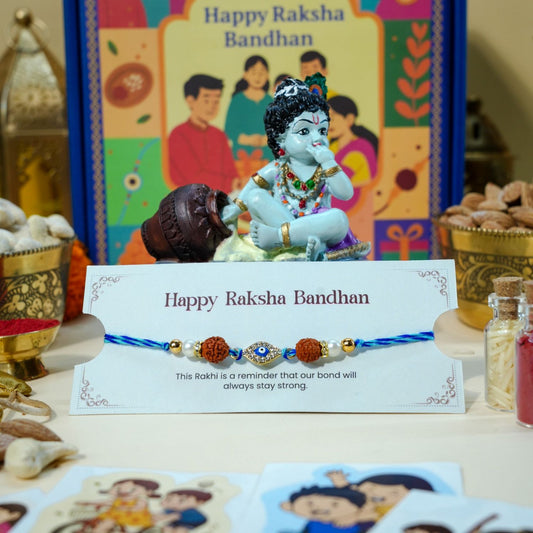 Rudraksha and Evil Eye Rakhi with Krishna idol for Raksha Bandhan spiritual gift hamper.