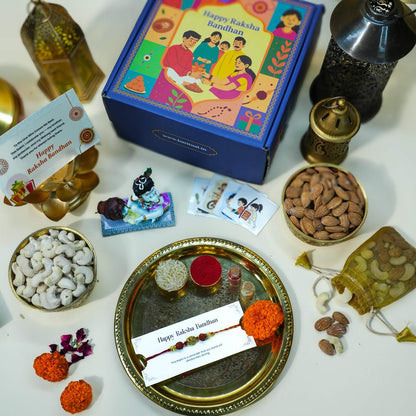 Raksha Bandhan gift hamper with Krishna idol, Rudraksha Rakhi, dry fruits, and ritual essentials.